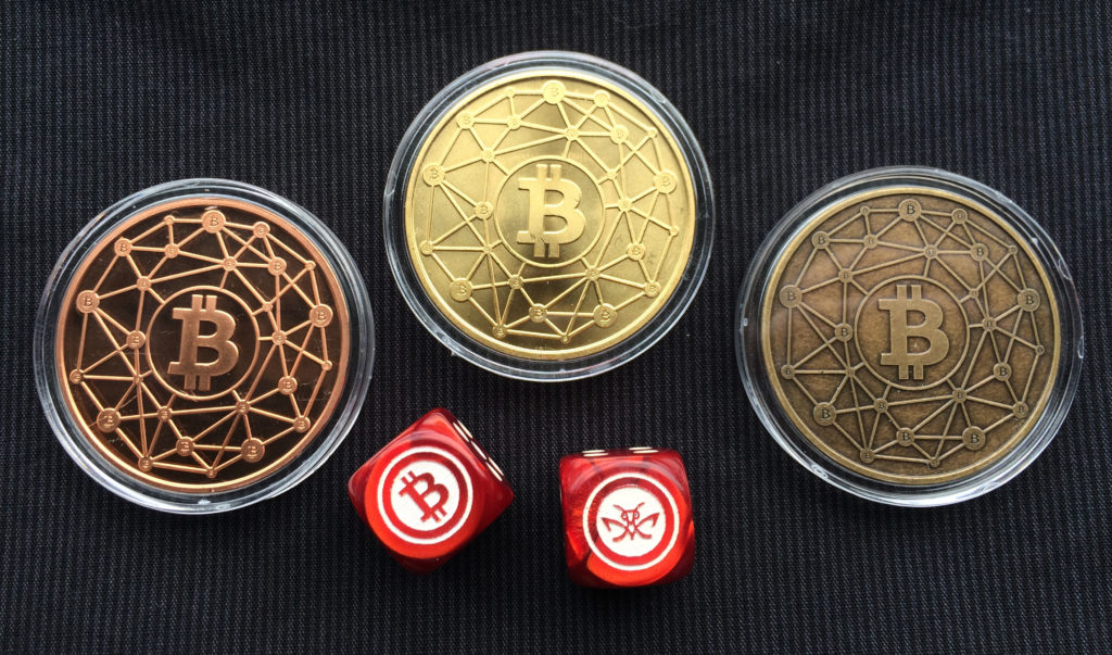 Cryptopods "Ravenbit Podified" coins in copper, brass and bronze, with Bitcoin dice. The dice are darn cool.