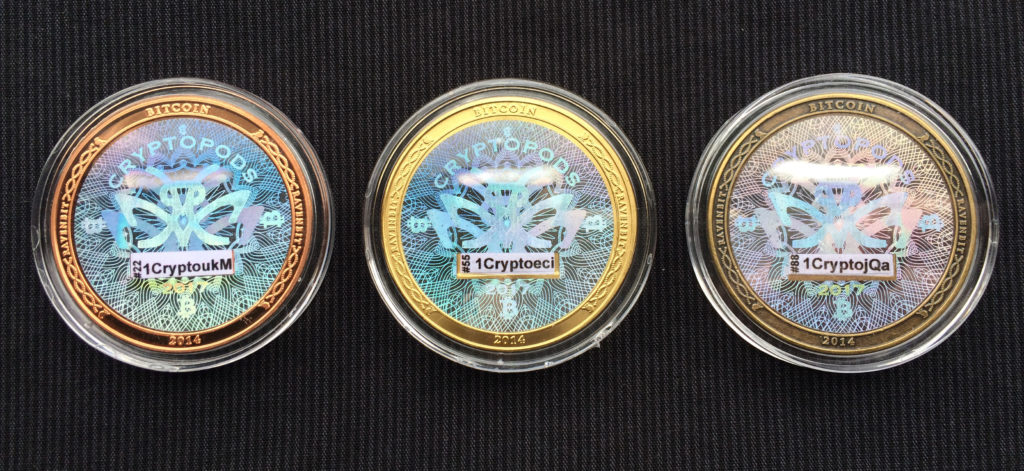 Cryptopods "Ravenbit Podified" coins in copper, brass and bronze, reverse.